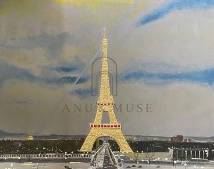 The Eiffel Tower in 22K gold leaf over chalk relief against a deep night sky